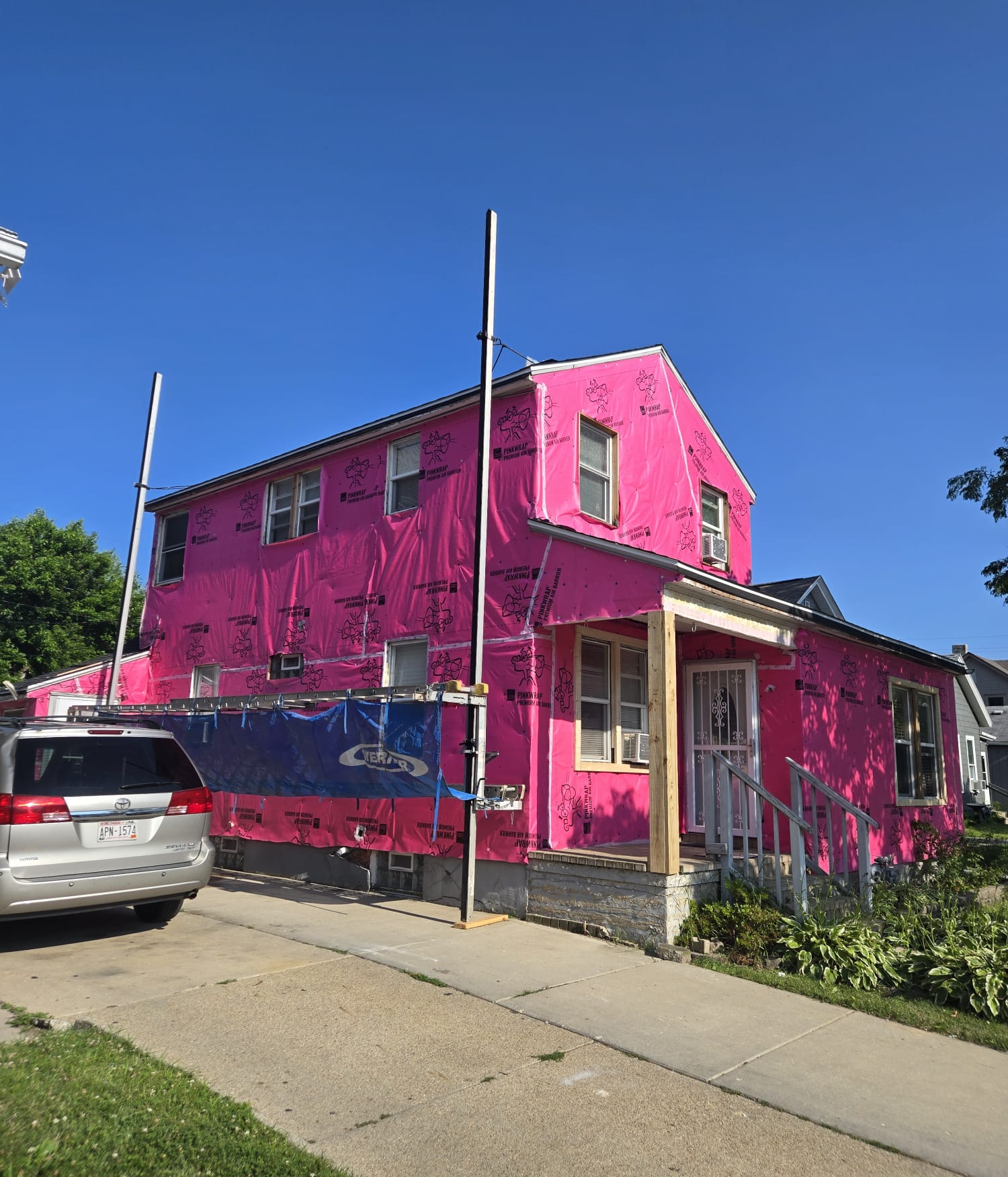 House wrap preparation for residential siding