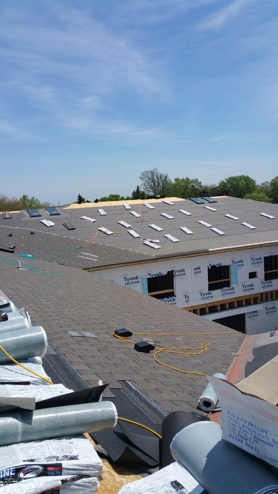 Asphalt shingle roof in active installation